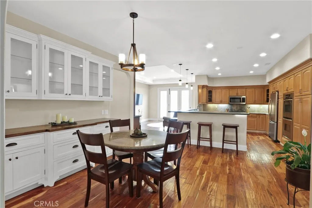 Dining area off to the other side of the kitchen with built-ins as well.