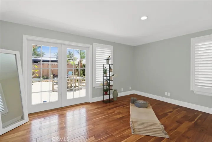 Yoga room off of Living Room with direct access to backyard