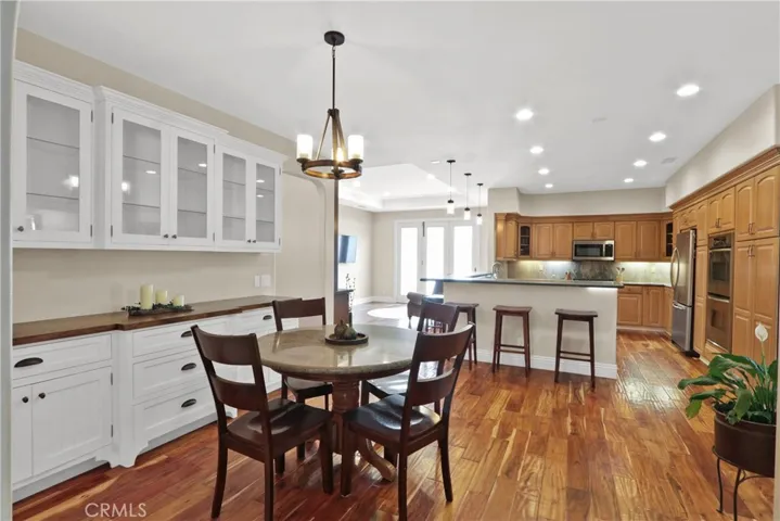 Dining area off to the other side of the kitchen with built-ins as well.