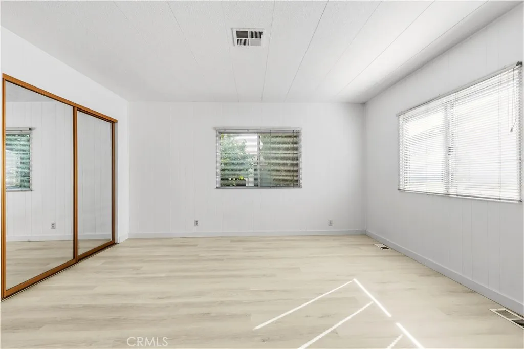 Primary Bedroom with walk-in closet