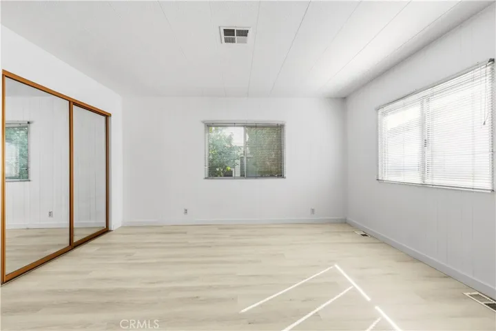 Primary Bedroom with walk-in closet