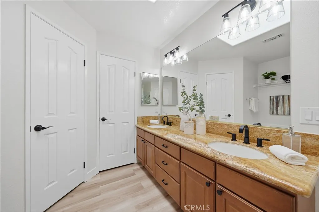 Primary Bathroom with 2 walk-in closets.