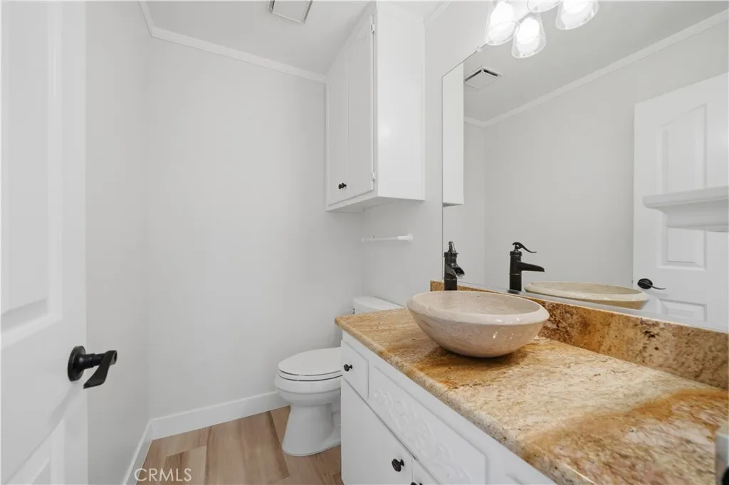 Downstairs guest half bathroom.