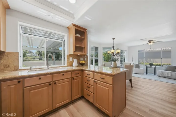 Kitchen opens to the dining room, perfect for entertaining.