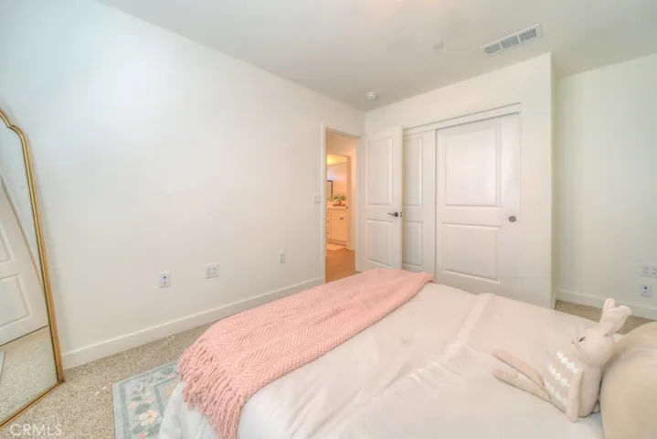 Bedrooms include carpet with 6-lb pad, with the option to upgrade to hard-surface flooring throughout the home.