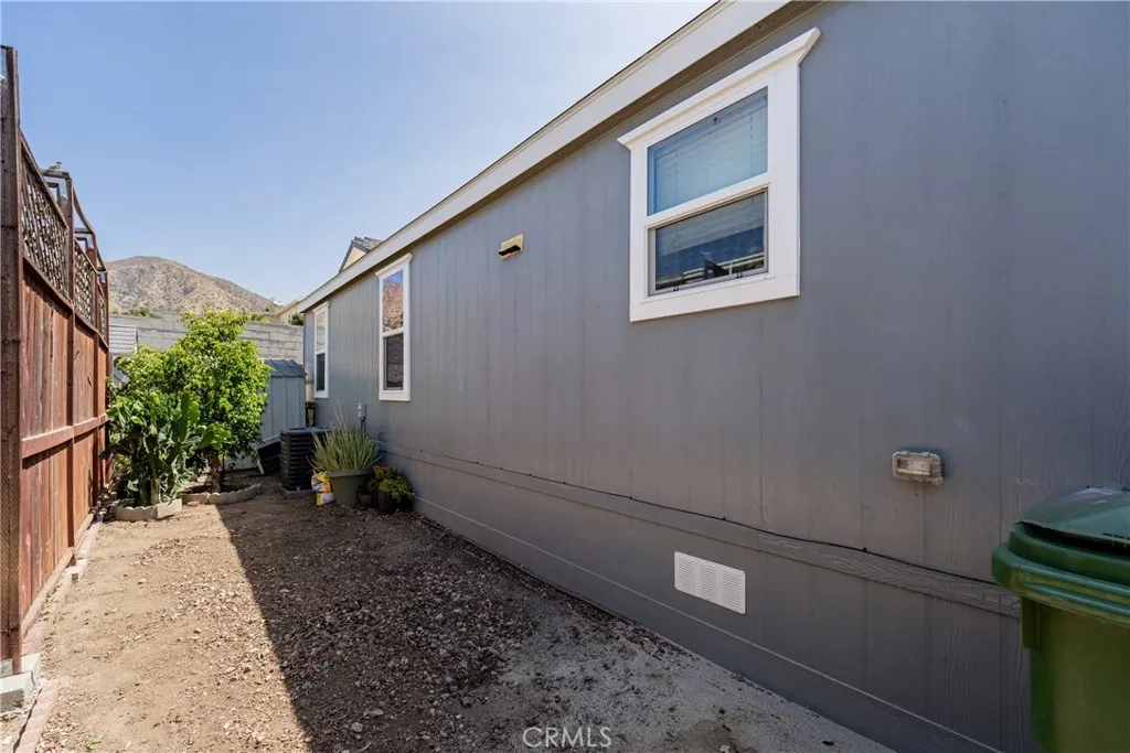 Side yard perfect for private garden.