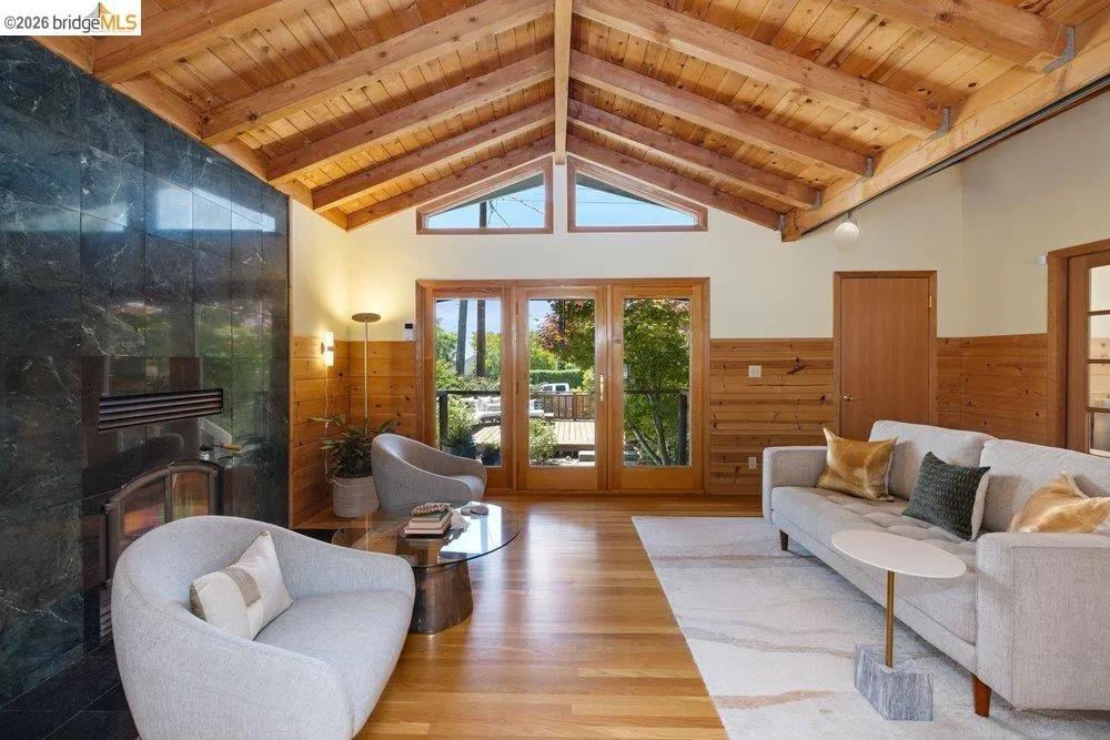 Vaulted wood-plank ceiling with exposed beams