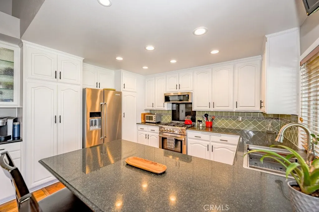 Kitchen recessed lighting with dimmer capability.