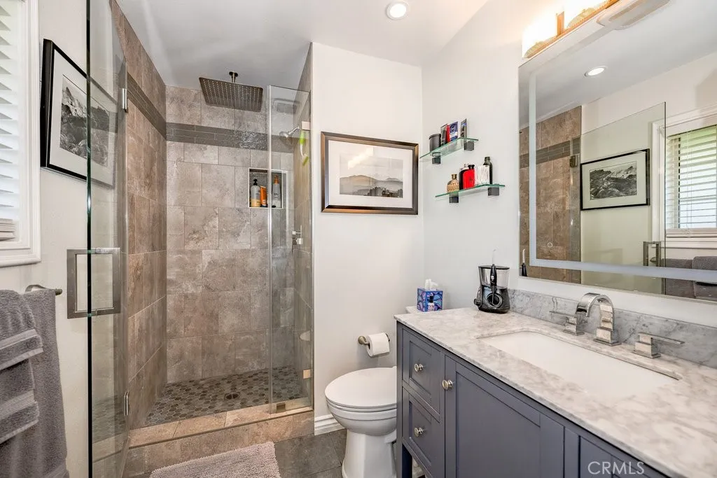Master Bathroom, lighted mirrors, newer fixtures, neutral paint