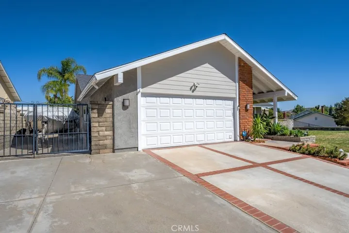 Gated Boat/RV parking. Large Driveway will hold at least 3 cars.