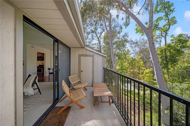 Private balcony off of the living room facing nature