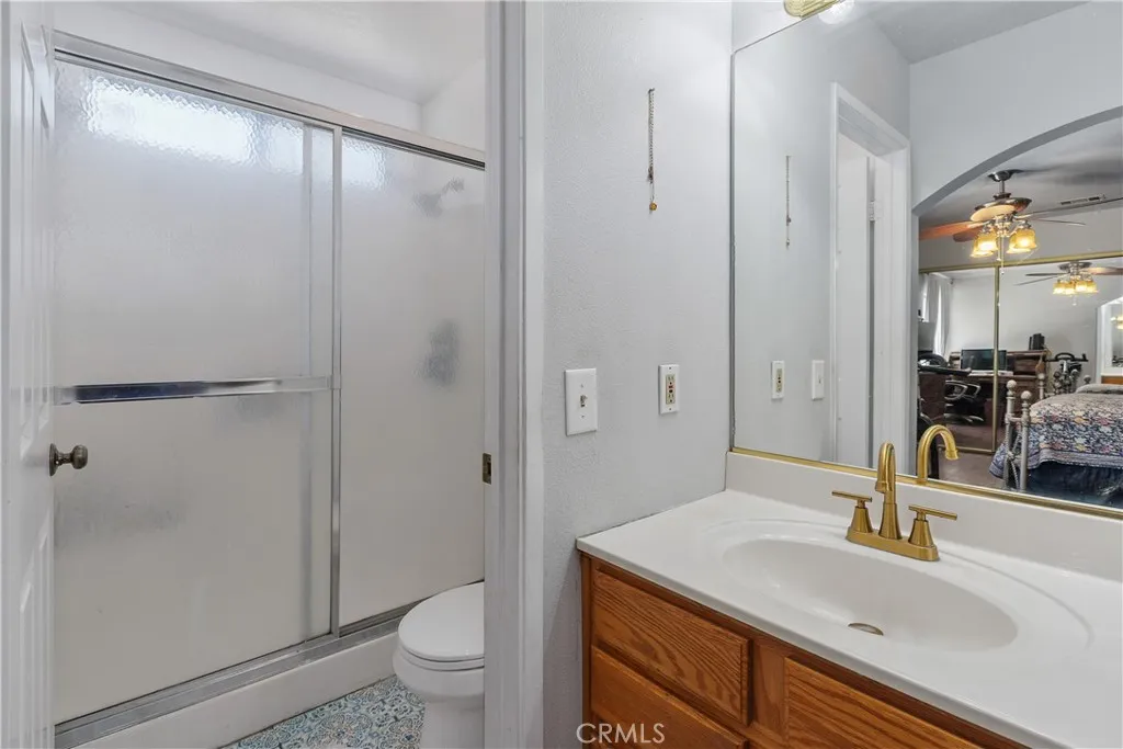 Convenient Primary Bathroom Layout With Walk-In Shower