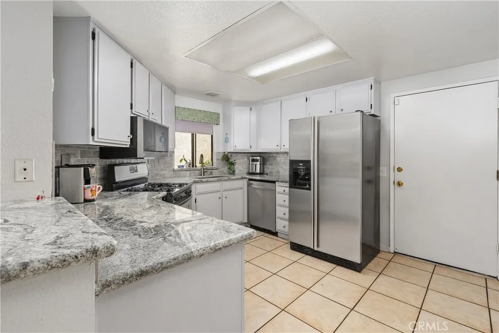 Updated Kitchen With Stainless Steel Appliances