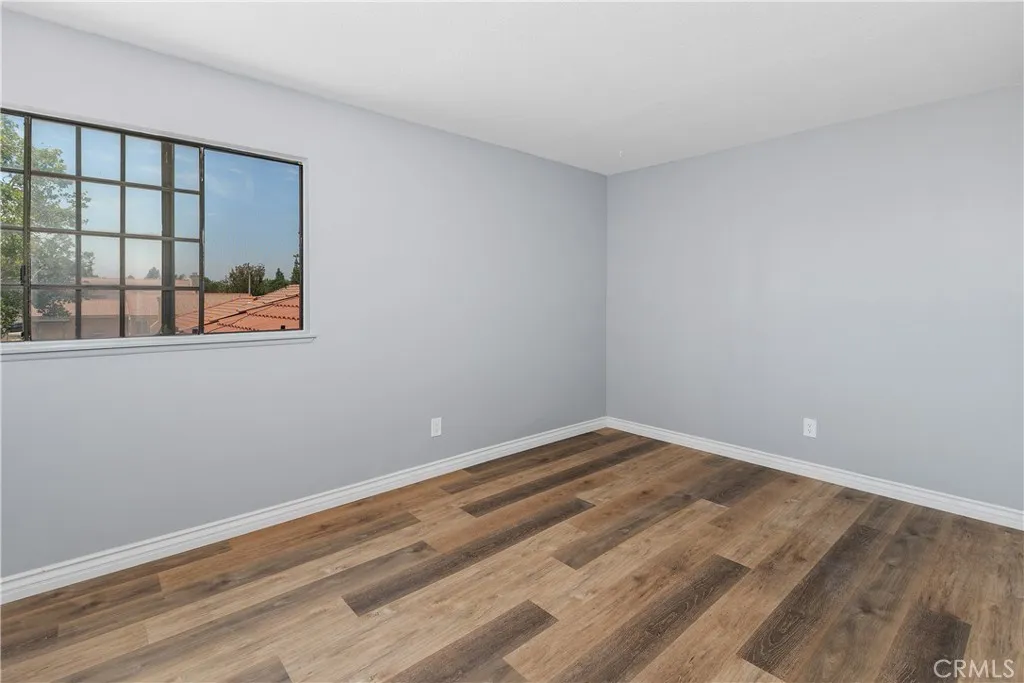 Bright Secondary Bedroom With Updated Flooring