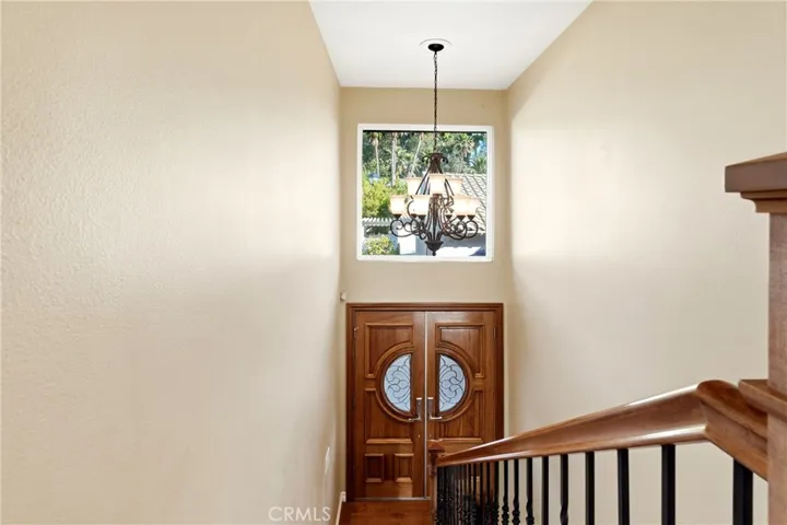 View of the front door from 1st floor hallway