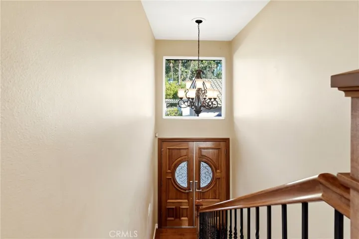 View of the front door from 1st floor hallway