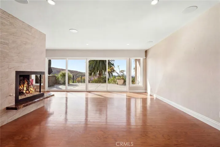 Living room without furniture. Altered to reflect the space.