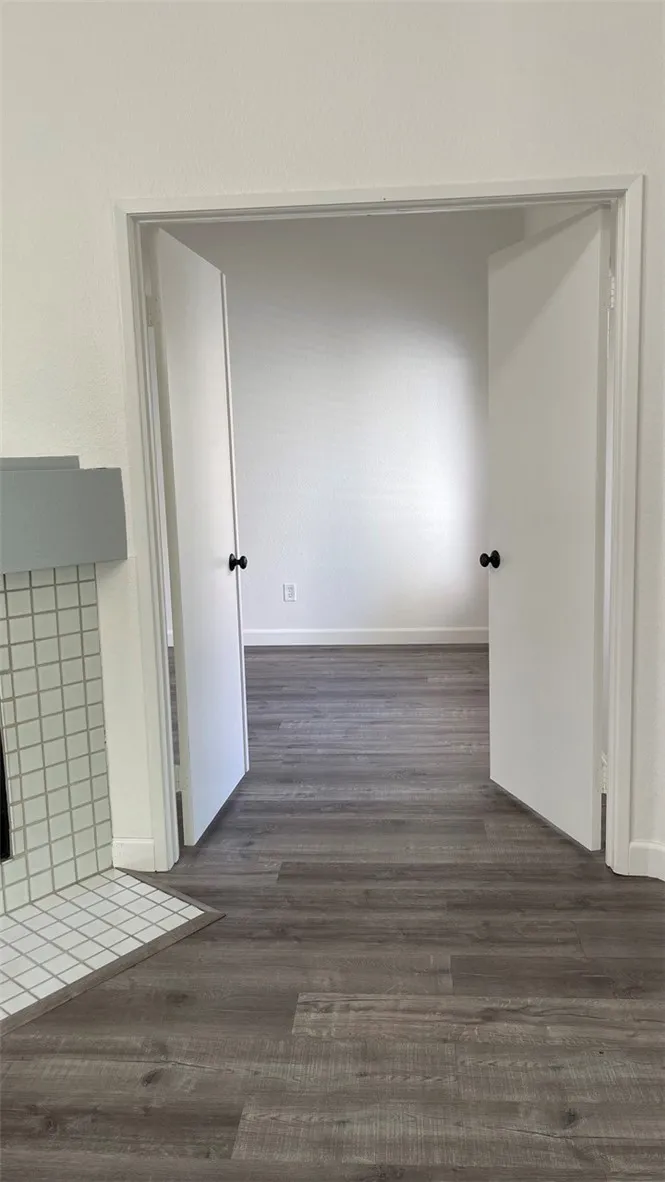Double Doors open to Second Bedroom