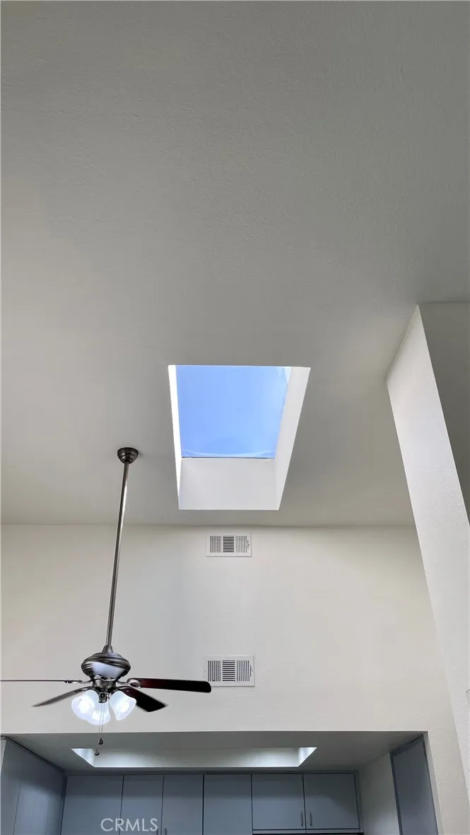 Skylight makes the room light and bright with natural sunlight.