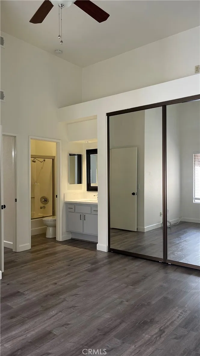 Primary Bedroom w/vaulted ceilings gives an open airy feel.