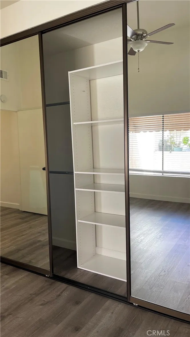 Large closet in primary with closet organizers