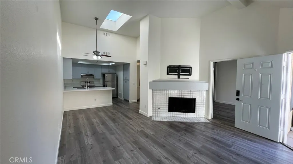 Living Room opens to Dining area, kitchen and to the right is the second bedroom - great for home office, or studio