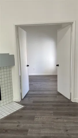 Double Doors open to Second Bedroom
