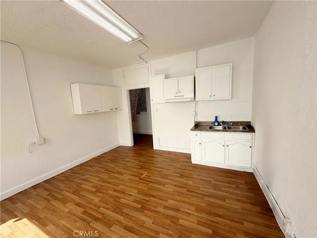 Abundant natural light, wood-style flooring