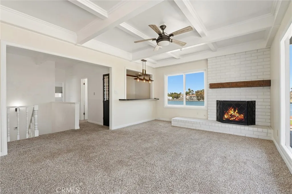 Upstairs bonus room. Fireplace digitially enhanced
