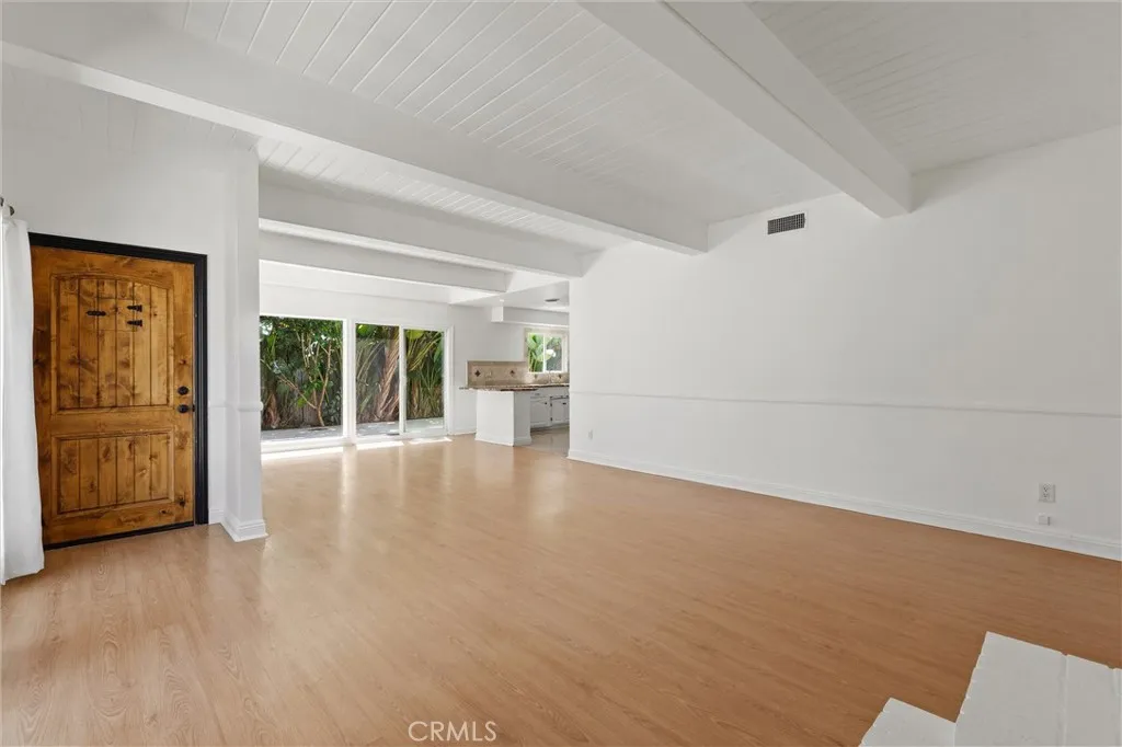 Entry leads to the spacious living area