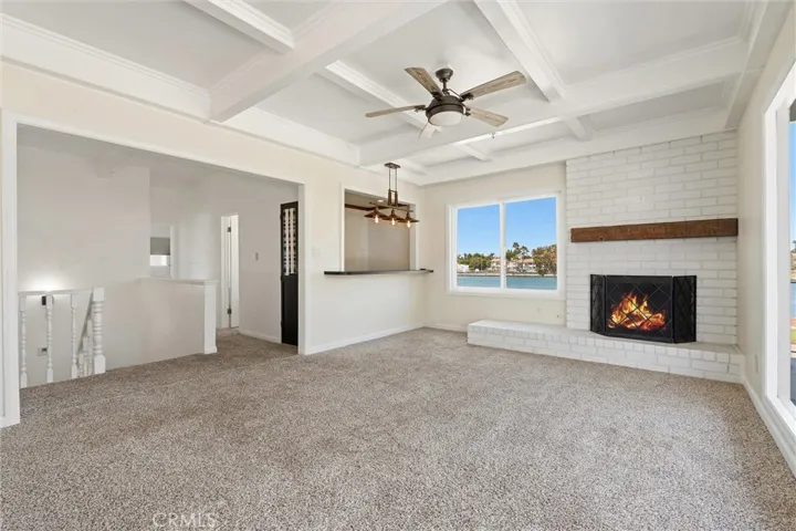Upstairs bonus room. Fireplace digitially enhanced