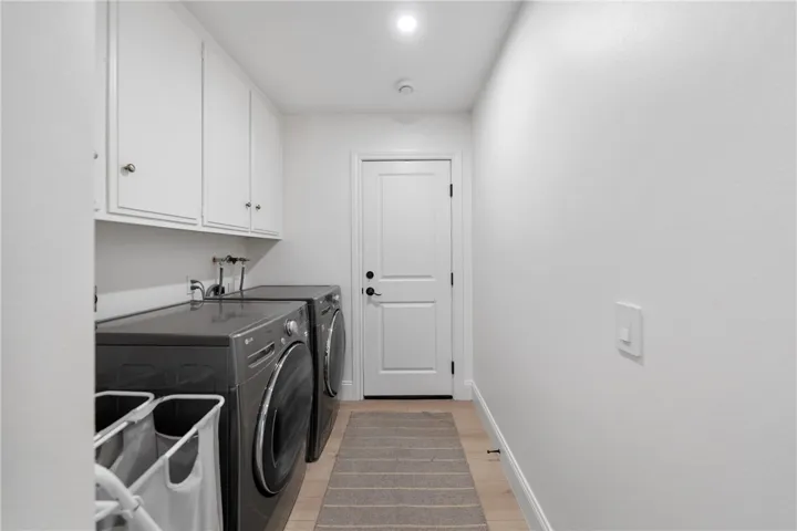 Laundry and 2 car garage access.