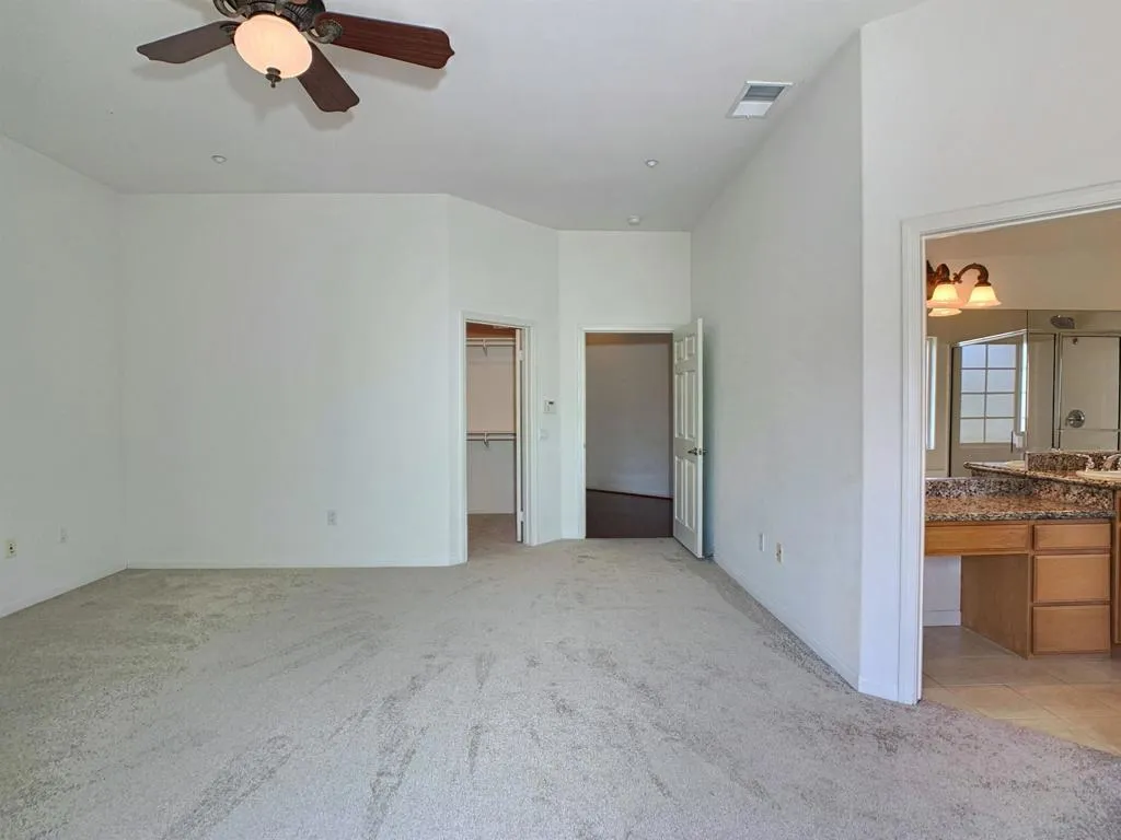 entrance to the primary bedroom and walk in closet