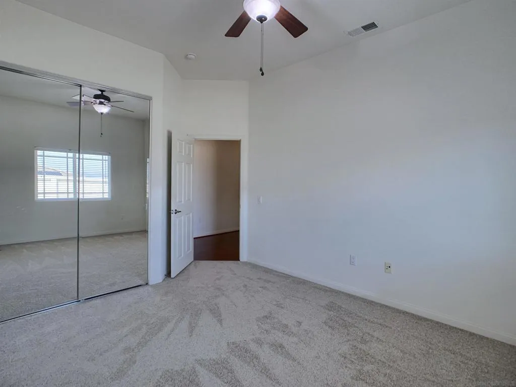bedroom with traditional closet