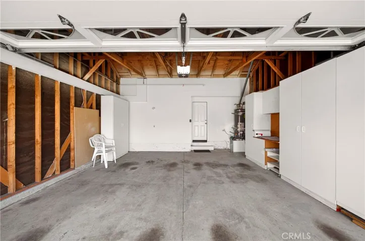 Direct access garage with ample storage.