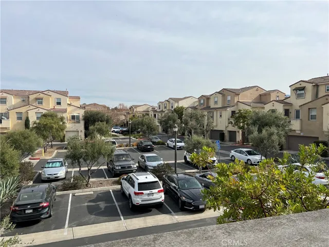 Public parking lot next to unit