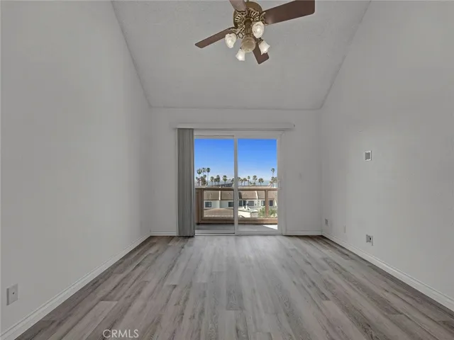 Primary bedroom with balcony and ocean view