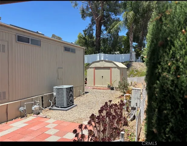 Side of home by garage port