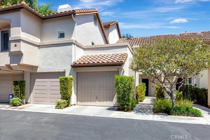 Front of home.  Private walkway and attached garage.  All photos posted are digitally enhanced.