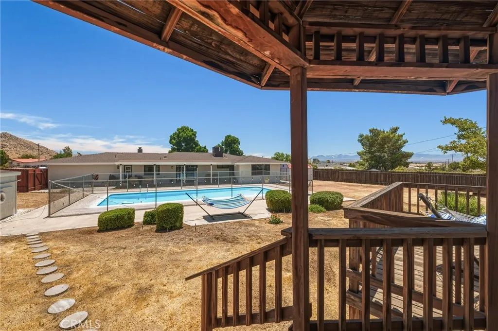 View from gazebo to house and pool