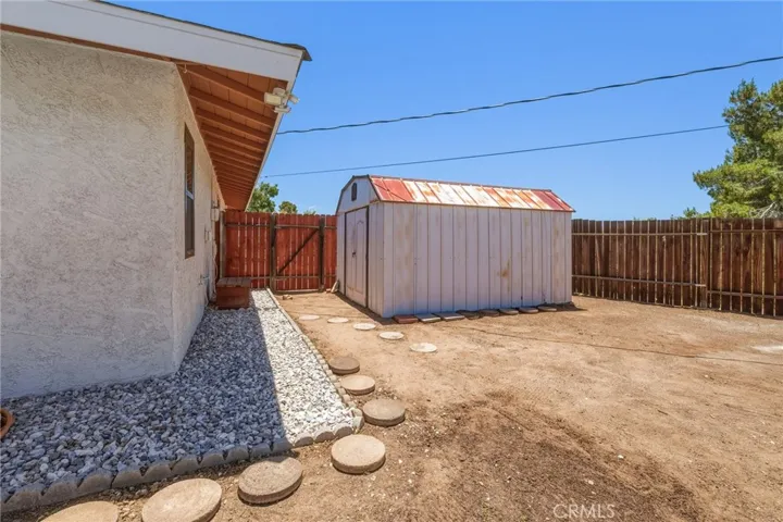 Side of house and shed