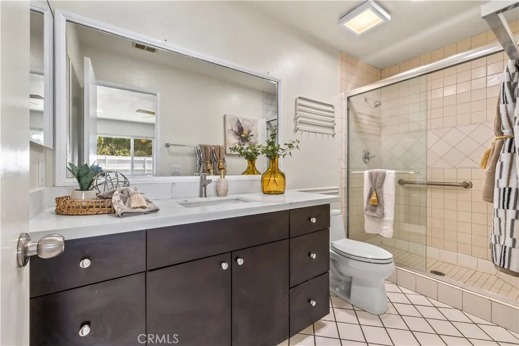 Bathroom with modern vanity and updated finishes