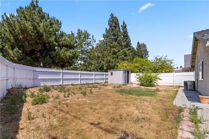 Generous backyard with park-adjacent views — ideal for entertaining