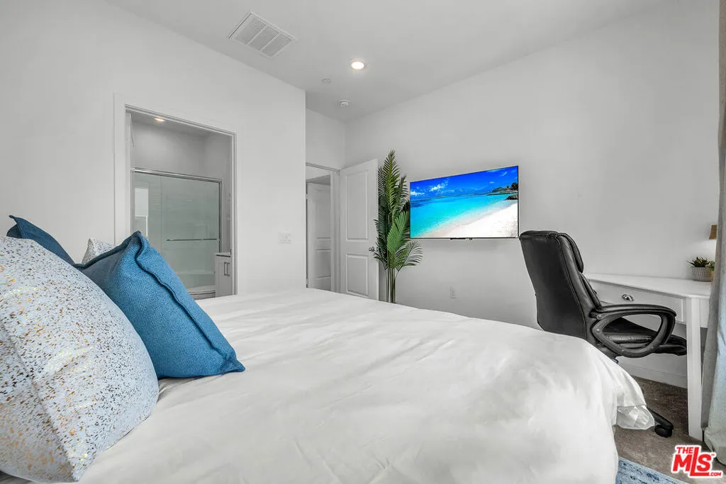 Flatscreen TV in Master Suite