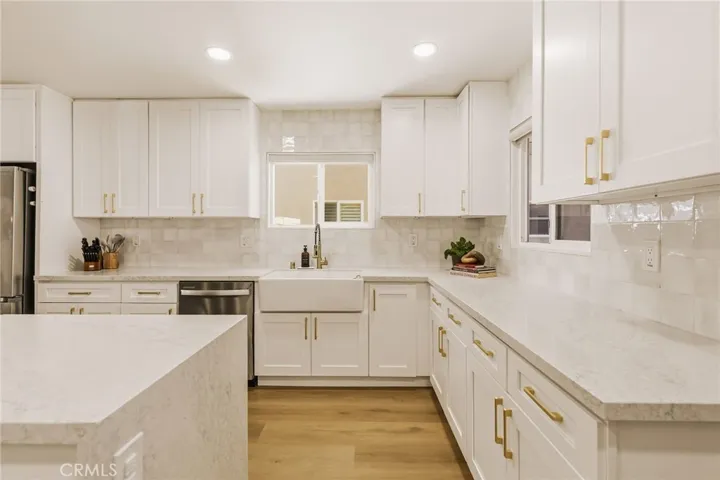 remodeled kitchen with quartz counters
