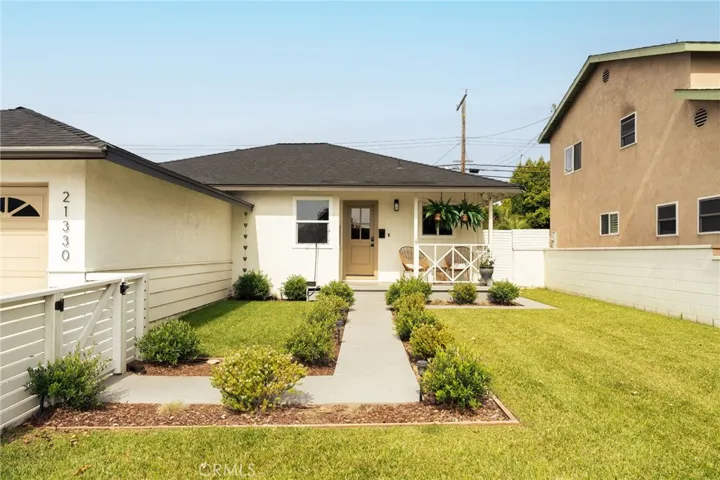 gated landscaped front yard