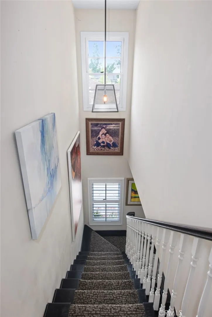 view of the staircase from upstairs bedrooms