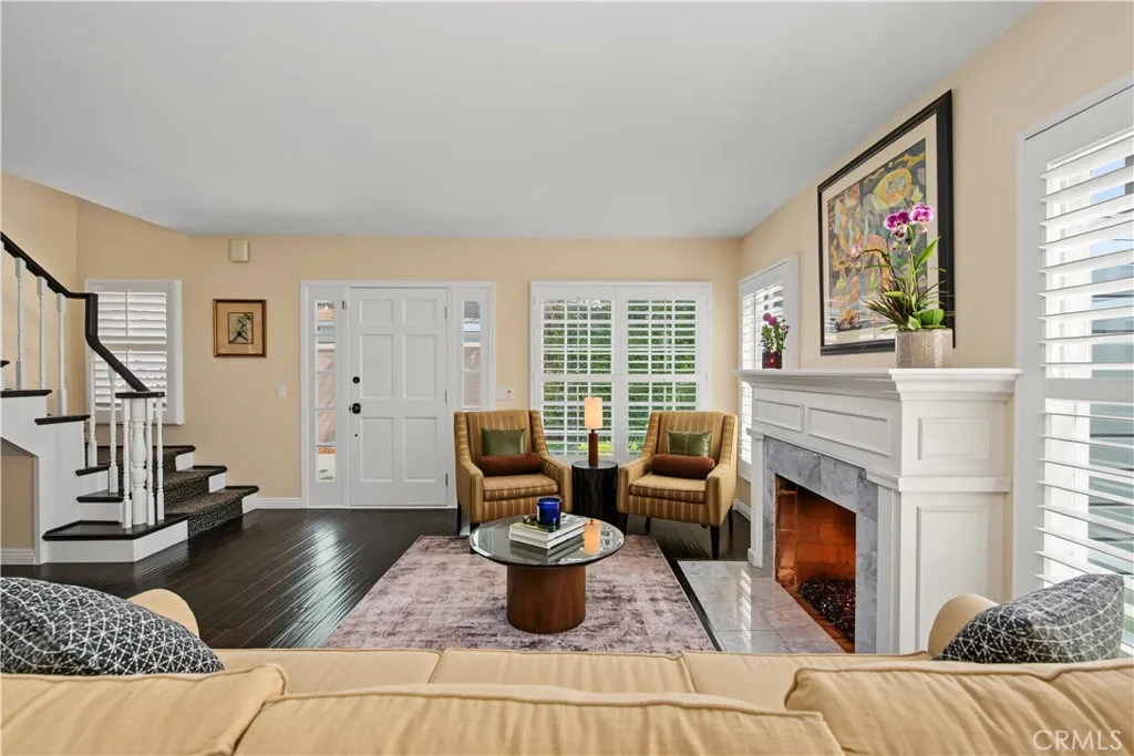 Front door with stairway to the second floor where there are 3 bedrooms and 2 bathrooms