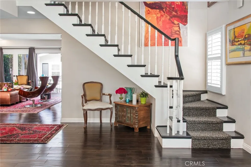 stairway leading to 3 bedrooms