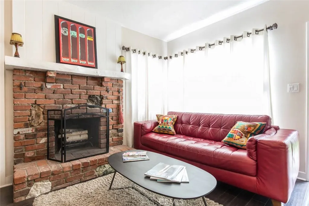 Cottage living room with working fireplace